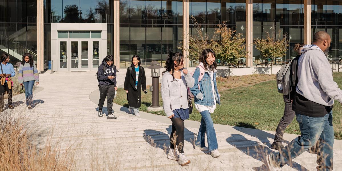 Students walking together outside.